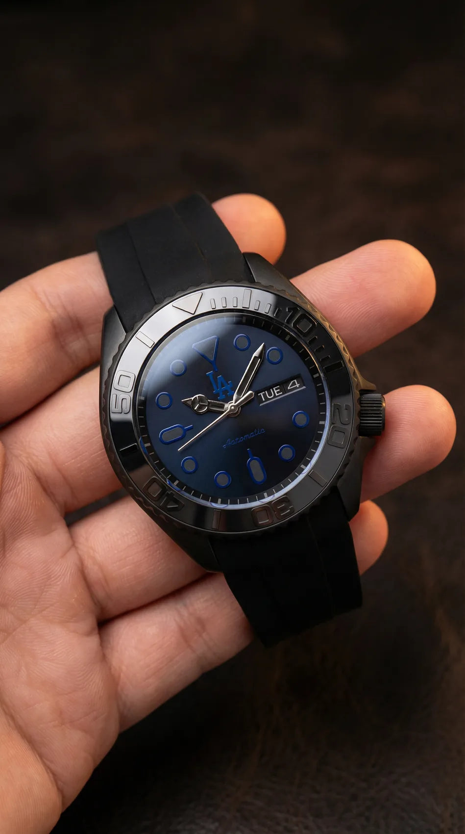 Client custom watch with blue dial details and a black strap