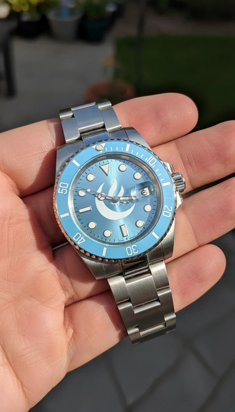 Ice-blue custom dial and bezel with a steel bracelet